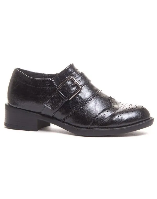 Derby noire avec lanière sur le coup de pied