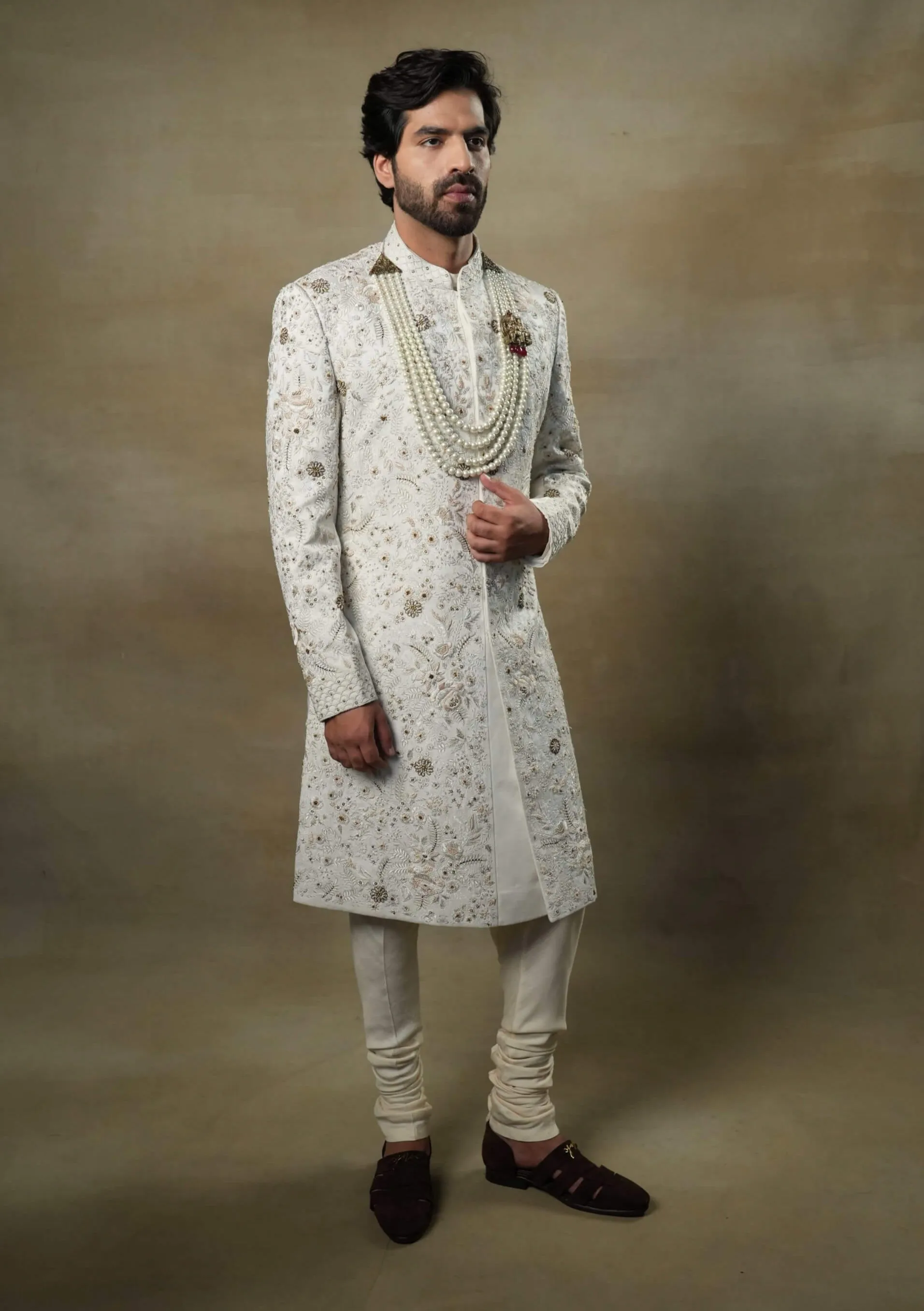 Ivory and gold sherwani set