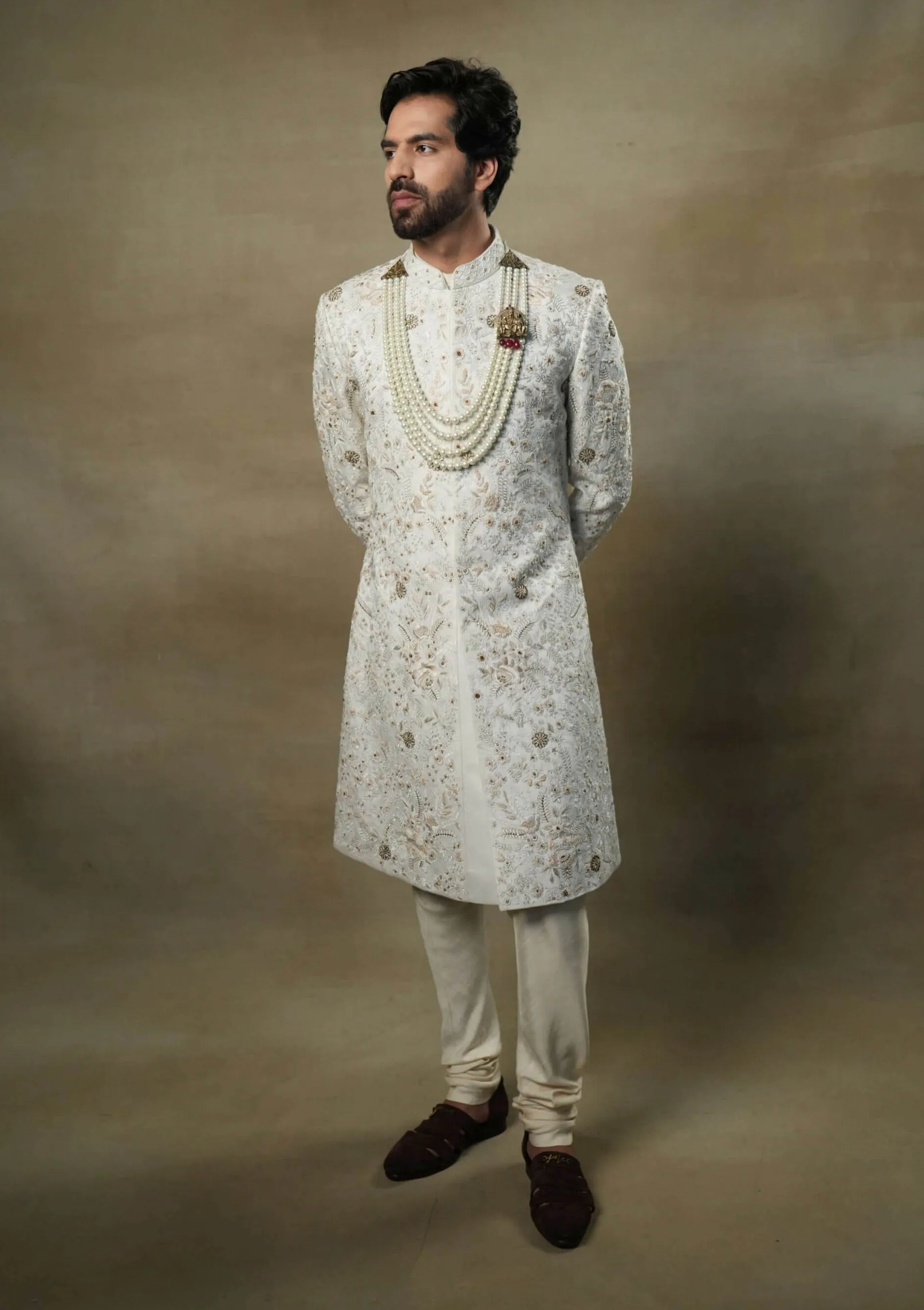 Ivory and gold sherwani set