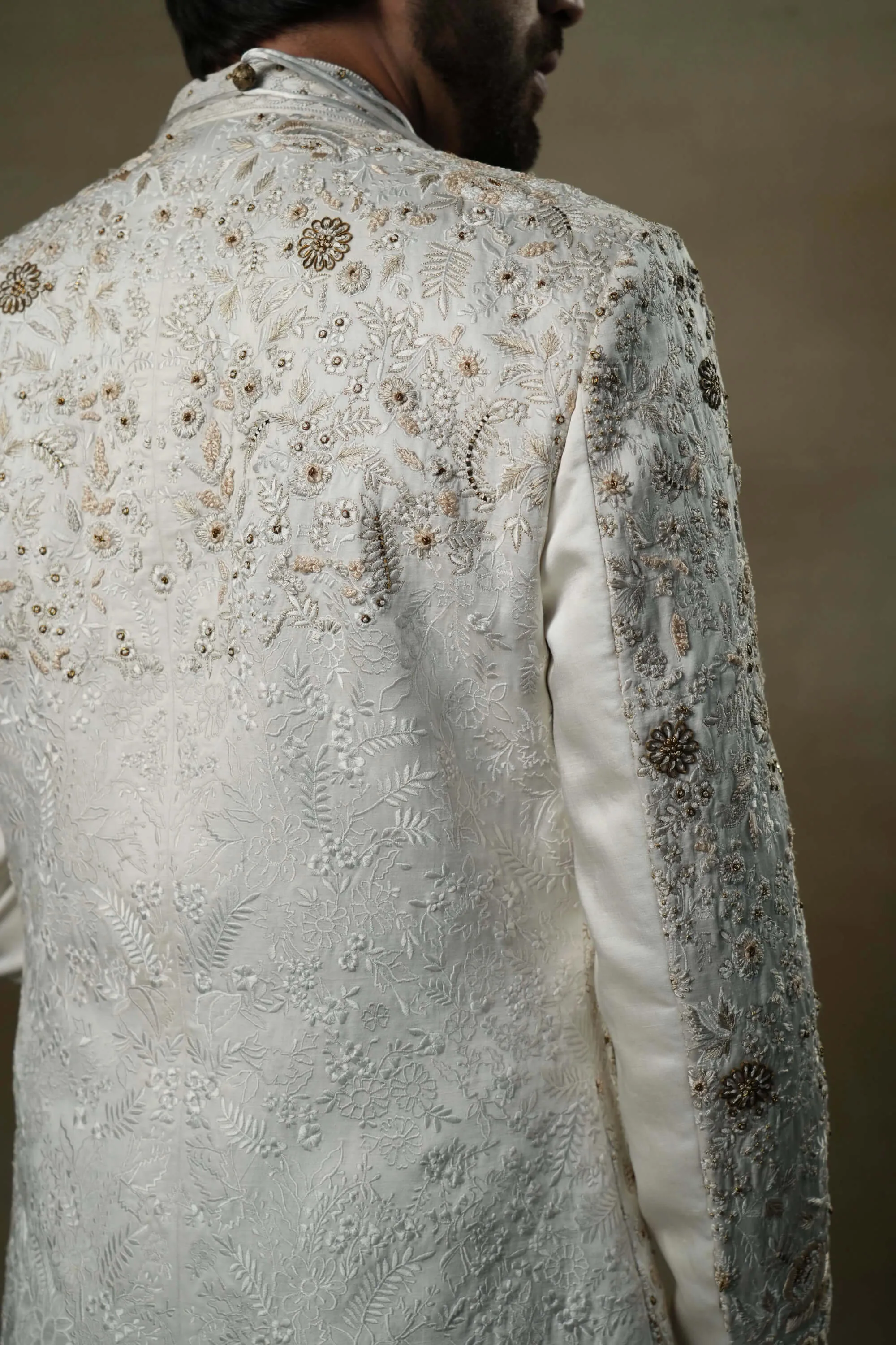 Ivory and gold sherwani set