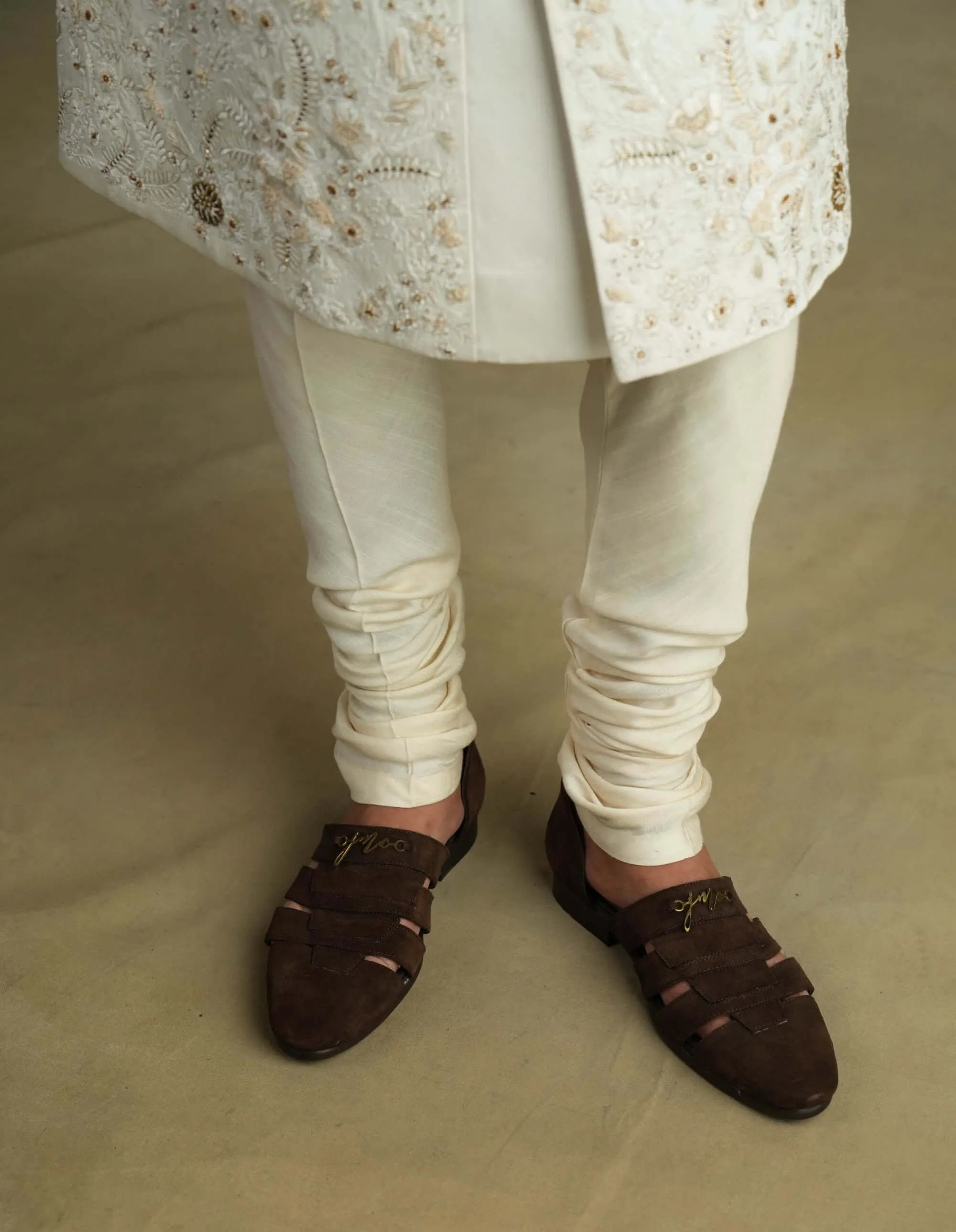 Ivory and gold sherwani set