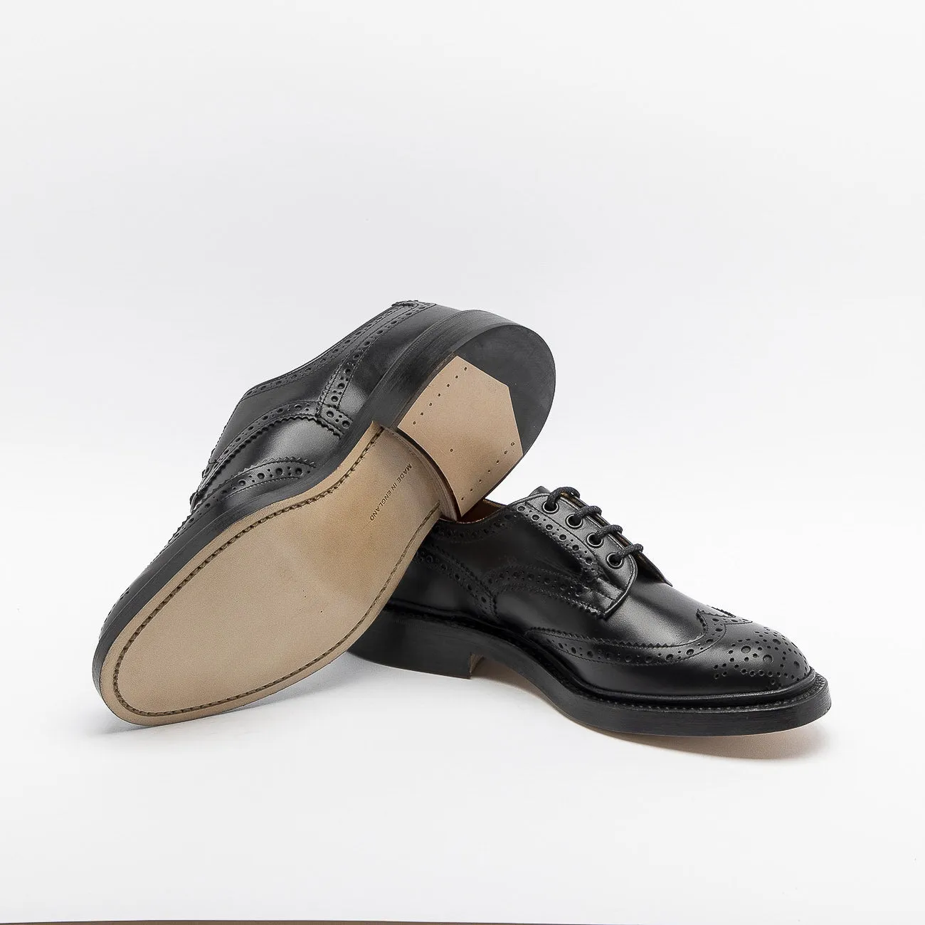 Stringata derby Tricker's Bourton in pelle nera (Suola cuoio)
